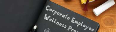 Corporate wellness program concept with team members discussing health and fitness initiatives in an office setting