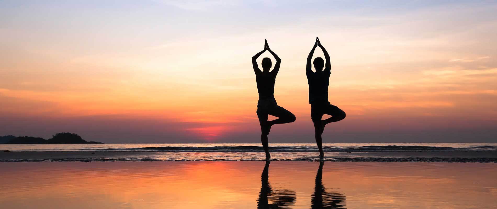 Yoga Poses on the Beach at Sunset